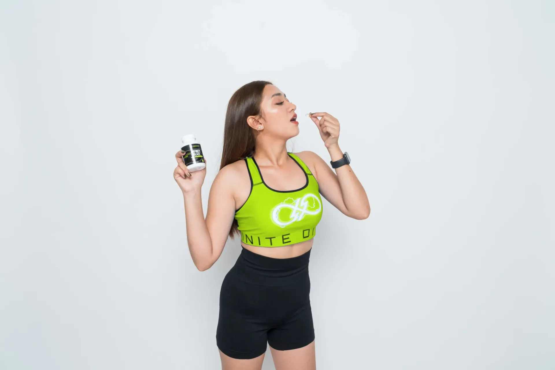 Apex athlete taking a performance supplement