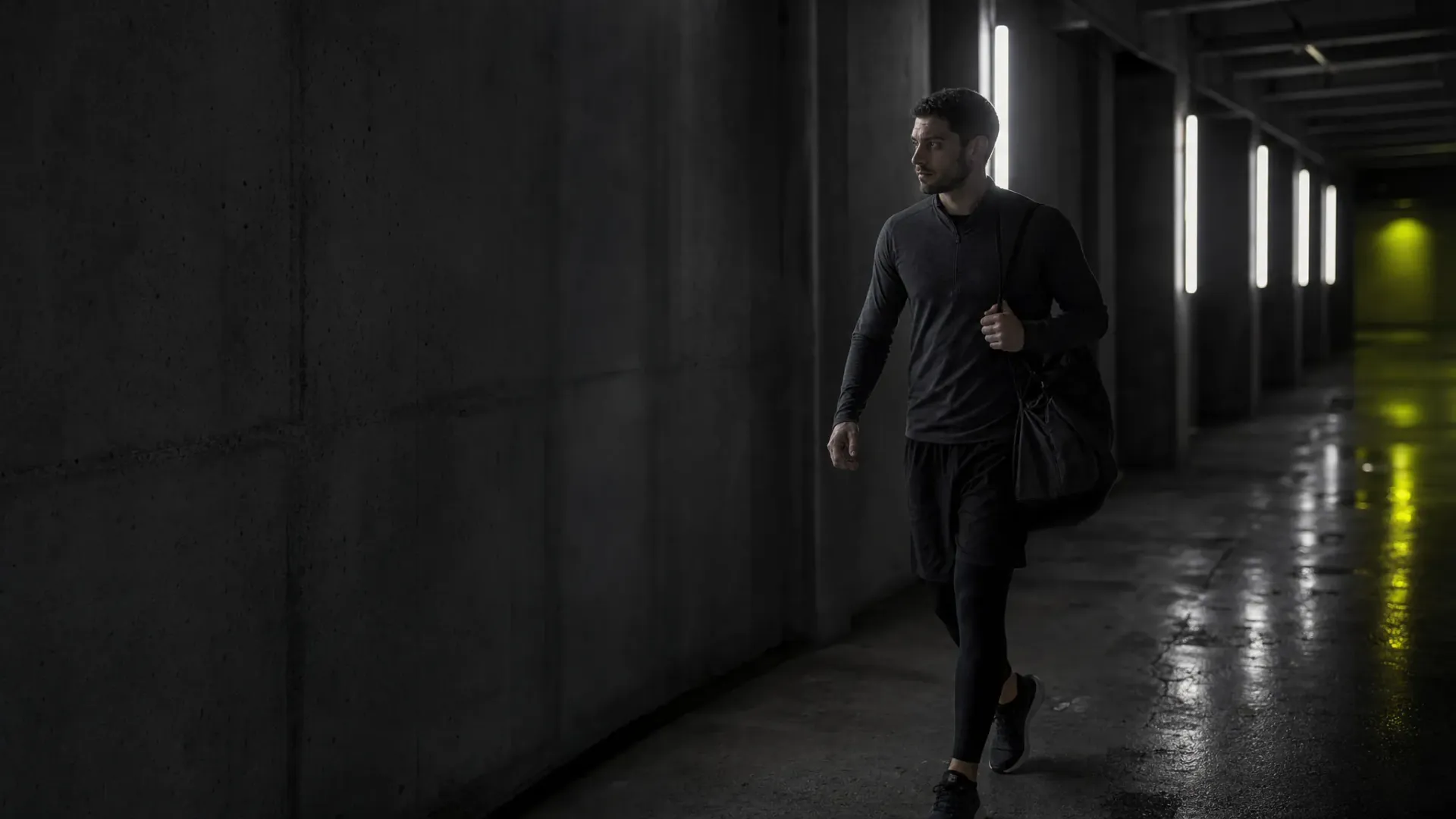 Apex athlete in a dark training environment